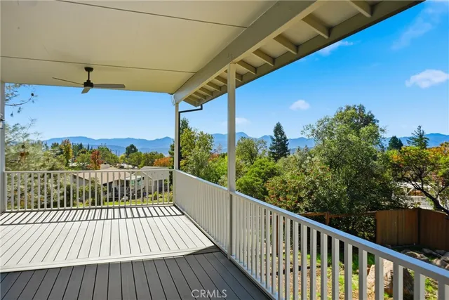 a view of balcony with wooden floor