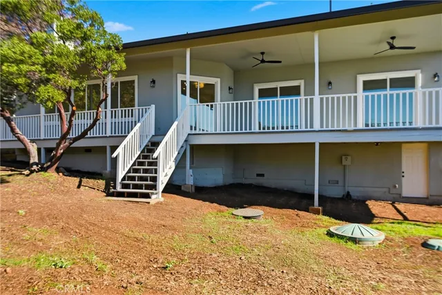 a view of balcony with wooden floor