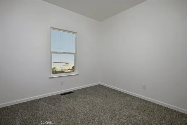 a view of cabinets with wooden floor