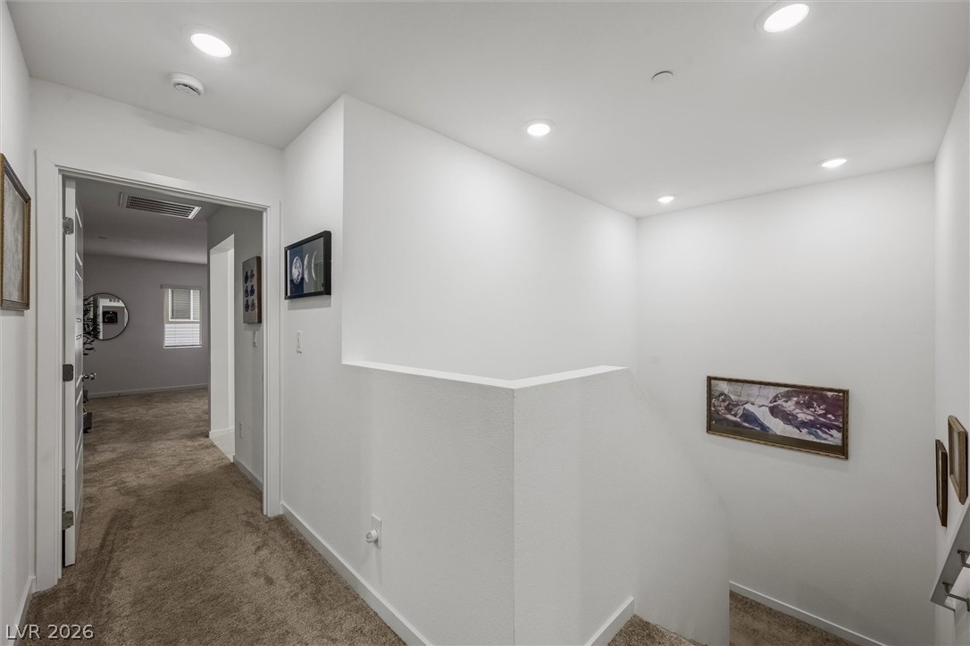175 Hazel Heights Henderson, NV 89011 - Photo 16 of 55 Hallway with an upstairs landing, carpet, and recessed lighting
