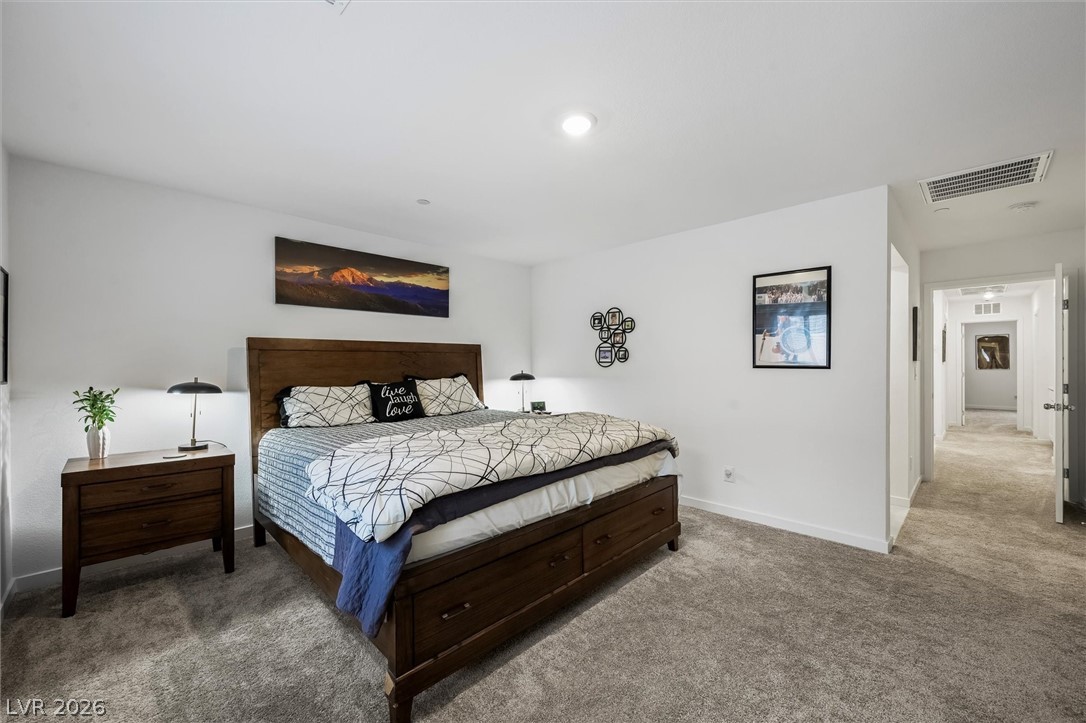 175 Hazel Heights Henderson, NV 89011 - Photo 18 of 55 Carpeted bedroom with baseboards