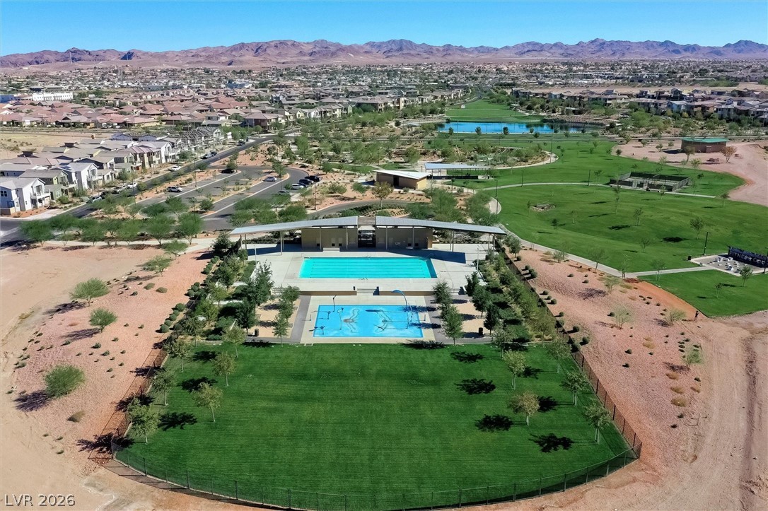 175 Hazel Heights Henderson, NV 89011 - Photo 2 of 55 Aerial view of residential area featuring a pool area and a water and mountain view