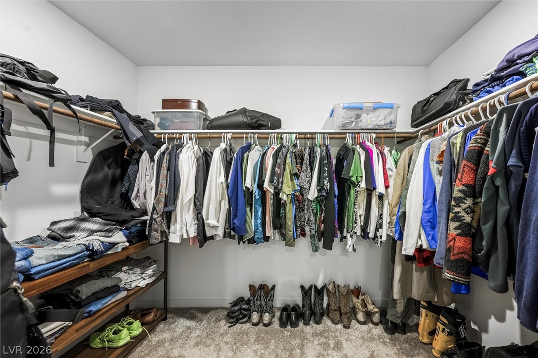 175 Hazel Heights Henderson, NV 89011 - Photo 21 of 55 Walk in closet featuring light colored carpet