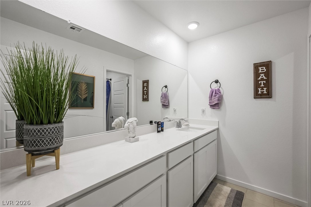 175 Hazel Heights Henderson, NV 89011 - Photo 29 of 55 Full bath with vanity and light tile patterned flooring