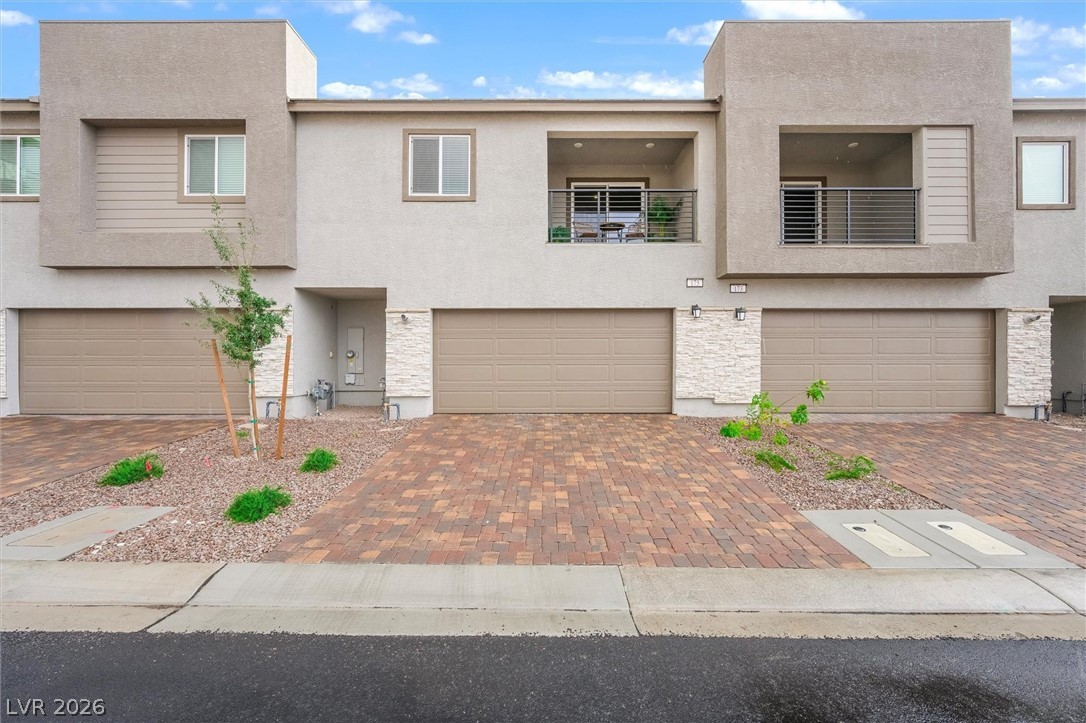 175 Hazel Heights Henderson, NV 89011 - Photo 39 of 55 View of front of house featuring stucco siding and a balcony