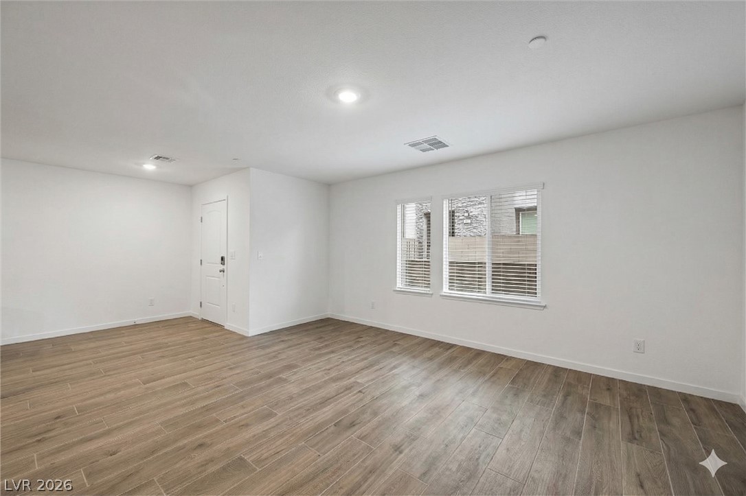 175 Hazel Heights Henderson, NV 89011 - Photo 45 of 55 Empty room with baseboards and wood finished floors