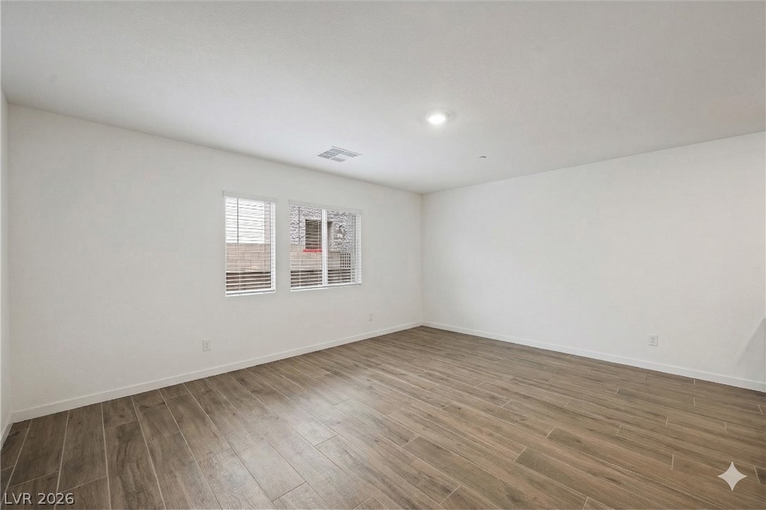 175 Hazel Heights Henderson, NV 89011 - Photo 47 of 55 Spare room featuring dark wood-style floors