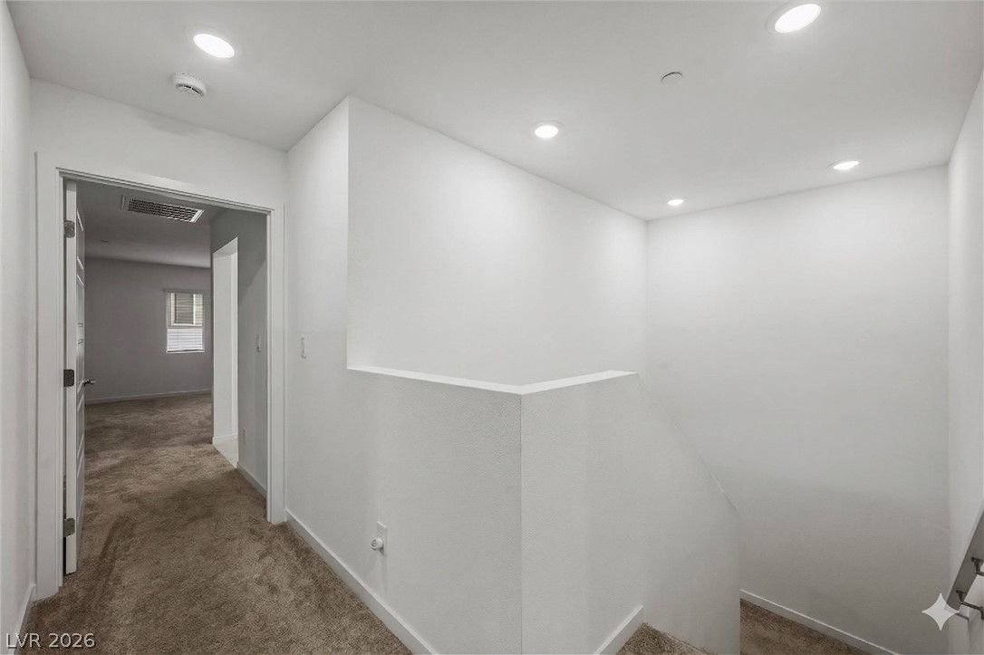 175 Hazel Heights Henderson, NV 89011 - Photo 49 of 55 Stairs with recessed lighting