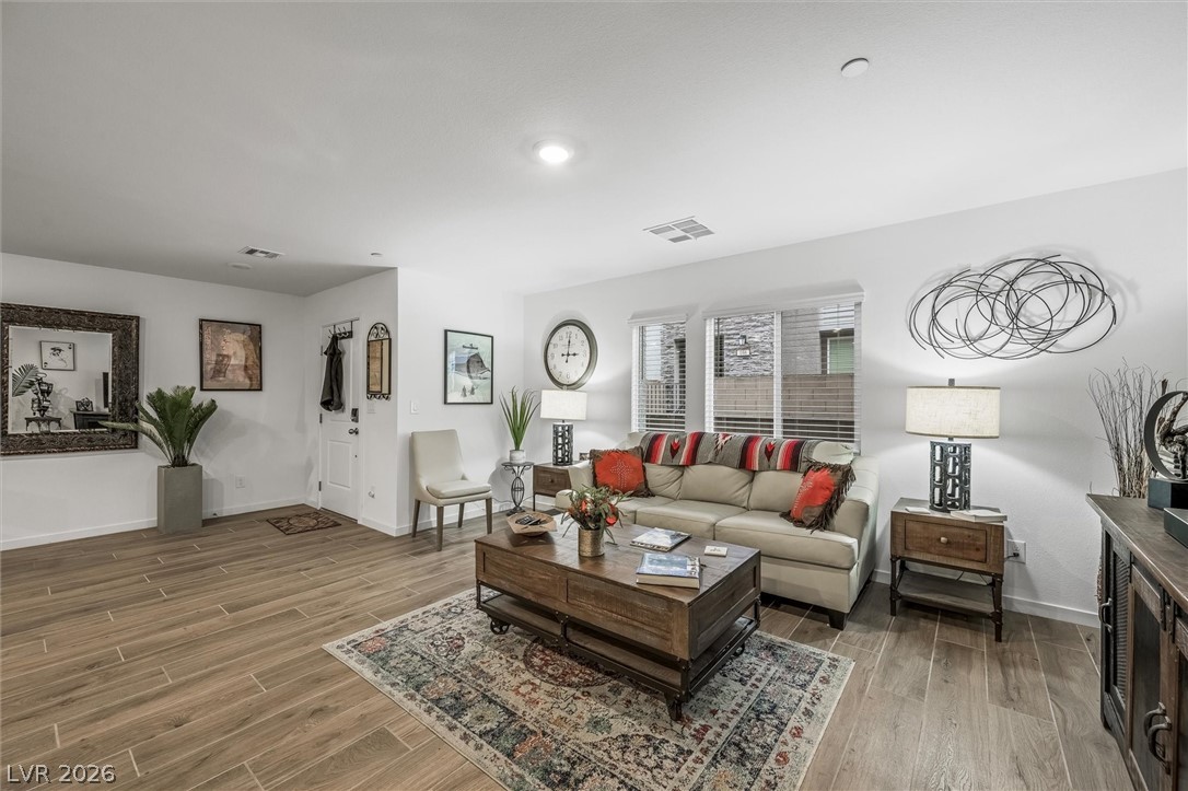 175 Hazel Heights Henderson, NV 89011 - Photo 6 of 55 Living room featuring wood finish floors