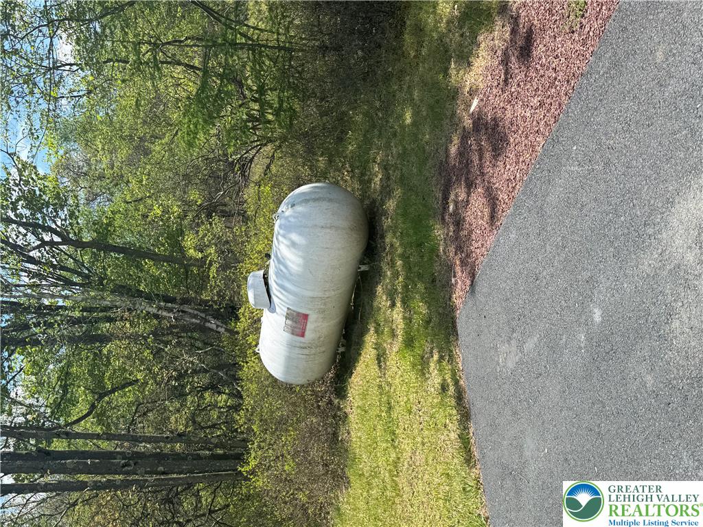 2742 Long Pond Road Long Pond, PA 18334 - Photo 11 of 57 A well-maintained propane tank provides essential fuel for modern living.