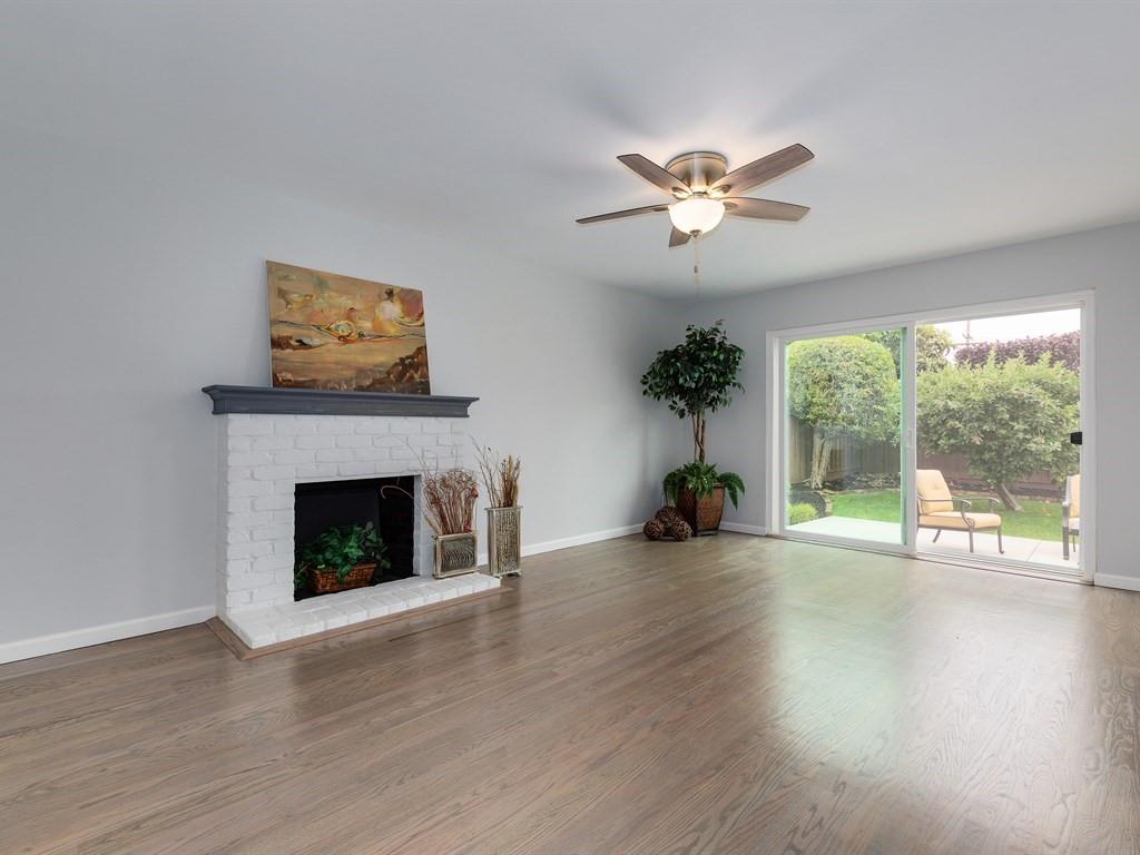 6258 Castillon Drive Newark, CA 94560 - Photo 4 of 20 a living room with furniture and a fireplace