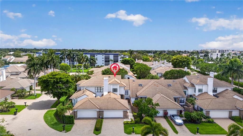 4030 Crayton Road, Unit C2 Naples, FL 34103 - Photo 7 of 32 an aerial view of multiple house