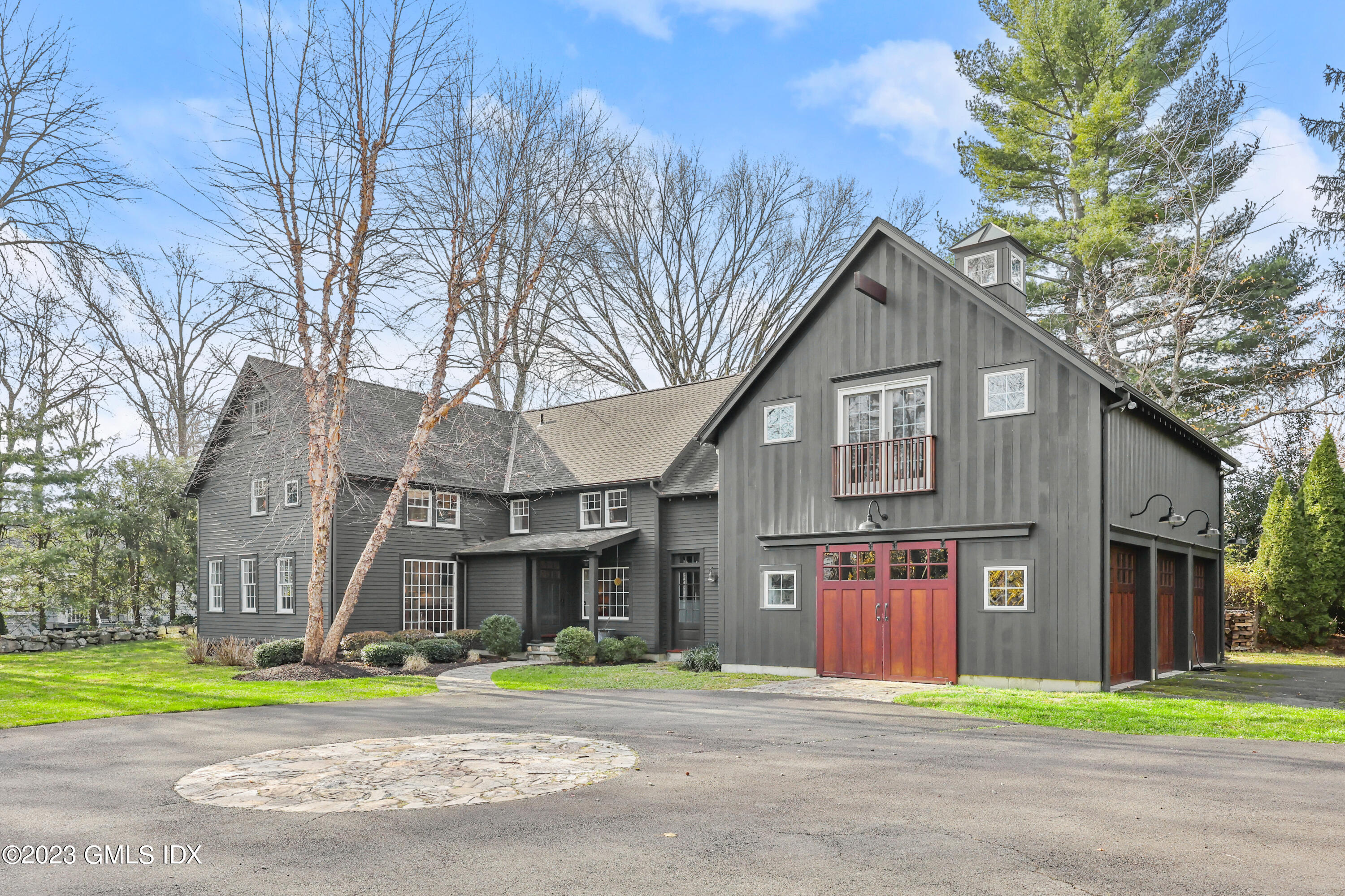 258 Riverside Avenue Riverside, CT 06878 - Photo 2 of 7 a front view of a residential houses with yard and trees