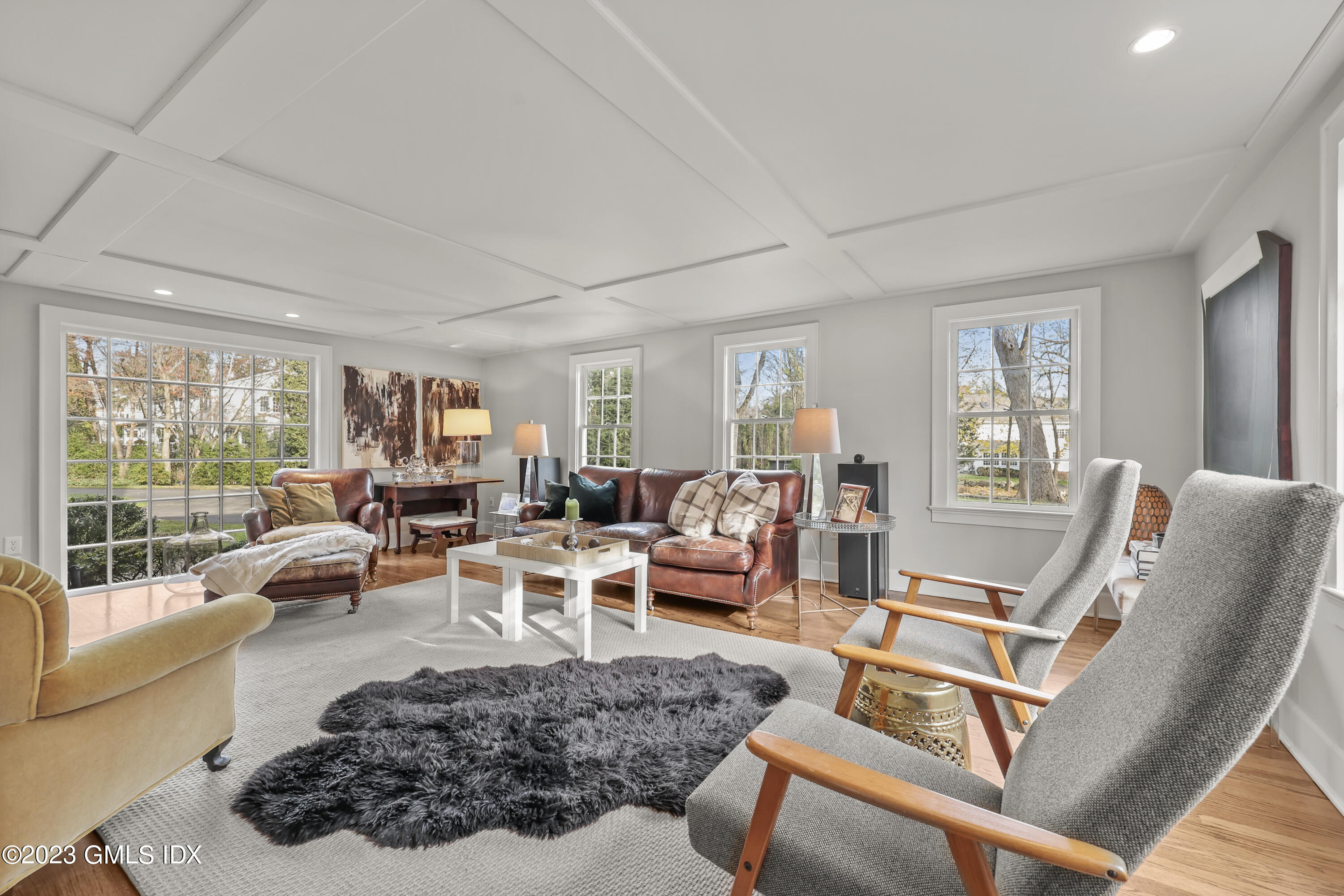 258 Riverside Avenue Riverside, CT 06878 - Photo 3 of 7 a living room with furniture or couch and a large window