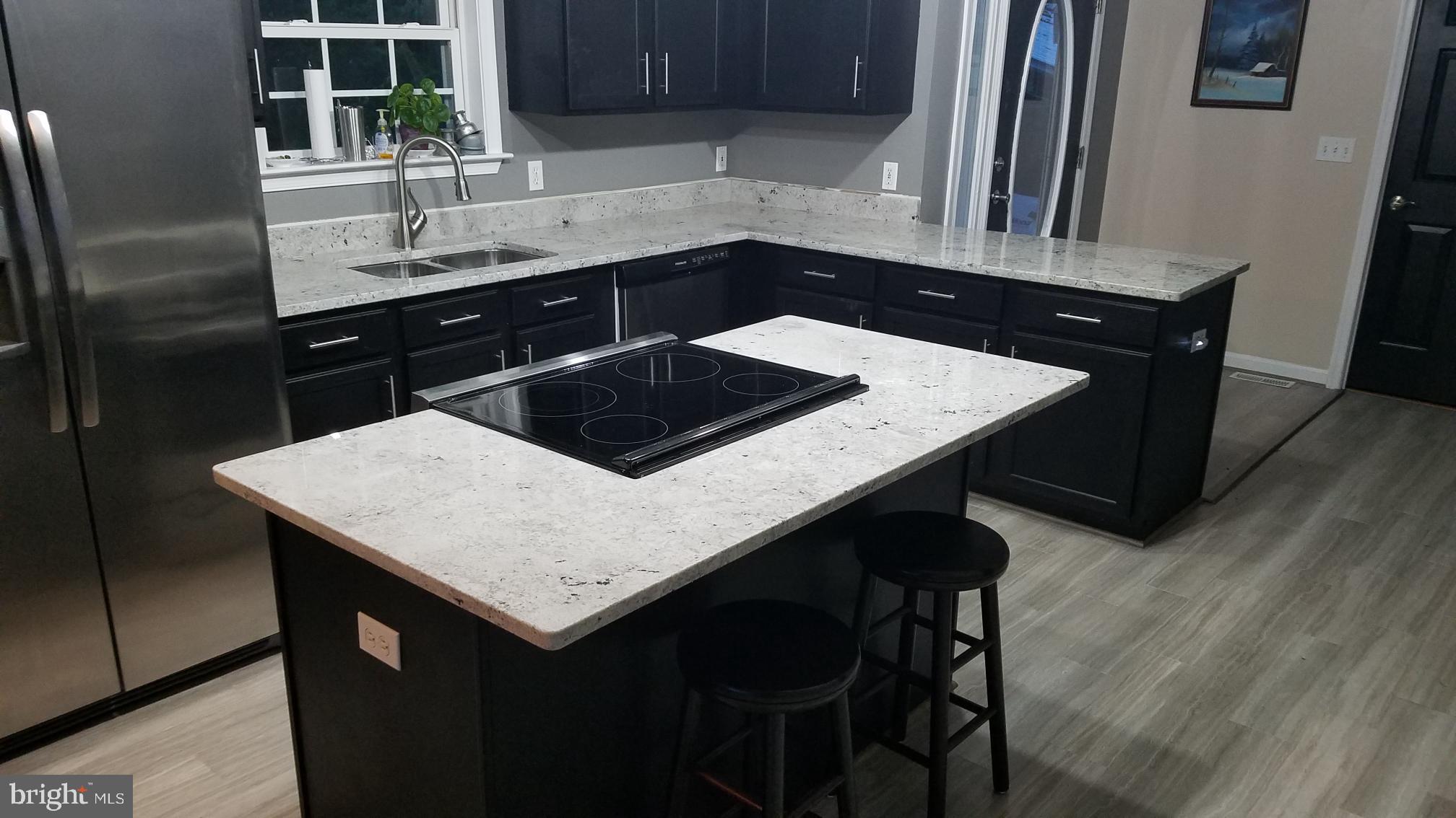 20976 Mattingly Road Abell, MD 20606 - Photo 10 of 36 New stove and granite