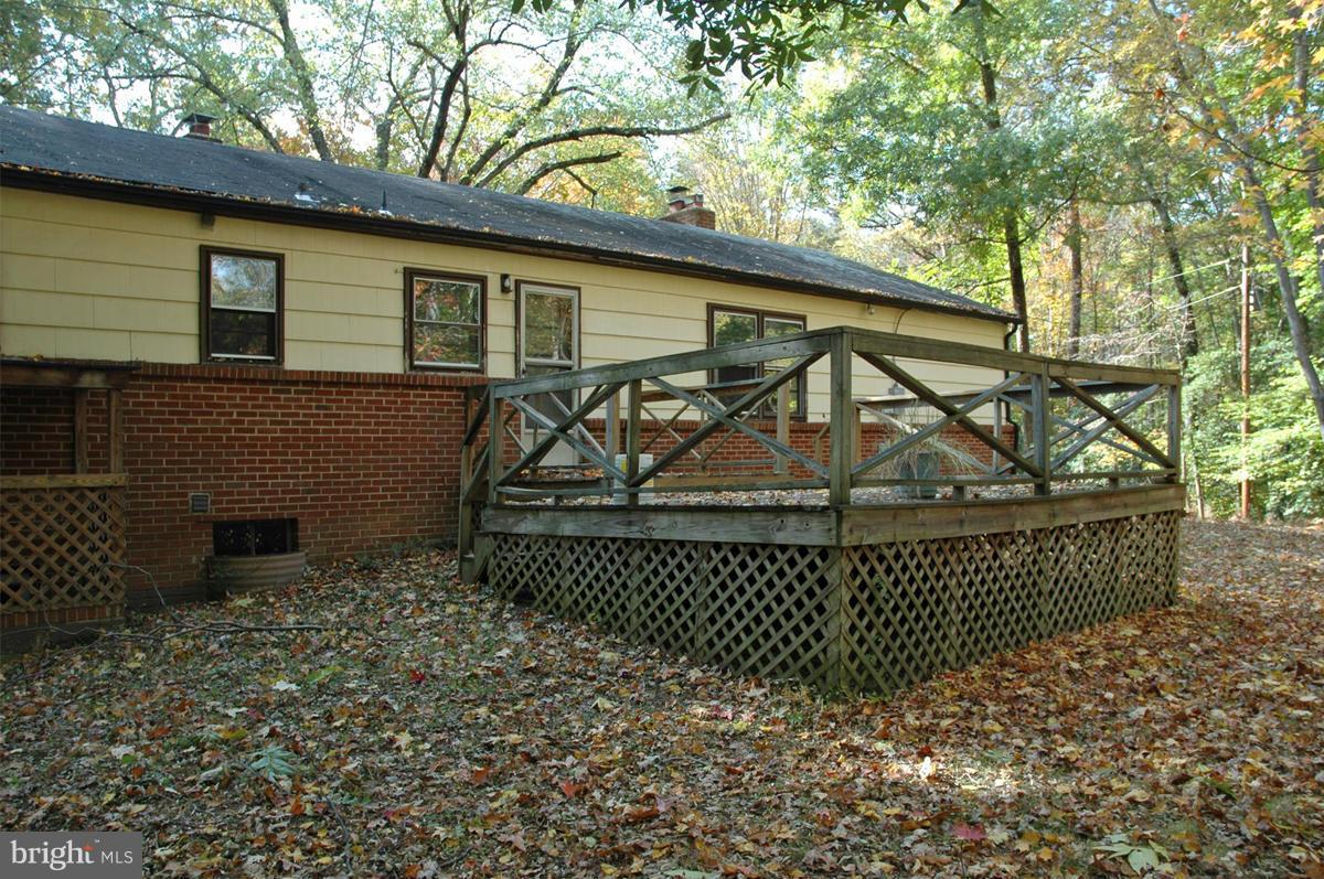 15102 Cactus Hill Road Accokeek, MD 20607 - Photo 3 of 24 a view of a house with a fence