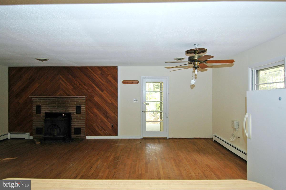 15102 Cactus Hill Road Accokeek, MD 20607 - Photo 10 of 24 a view of empty room with a fireplace