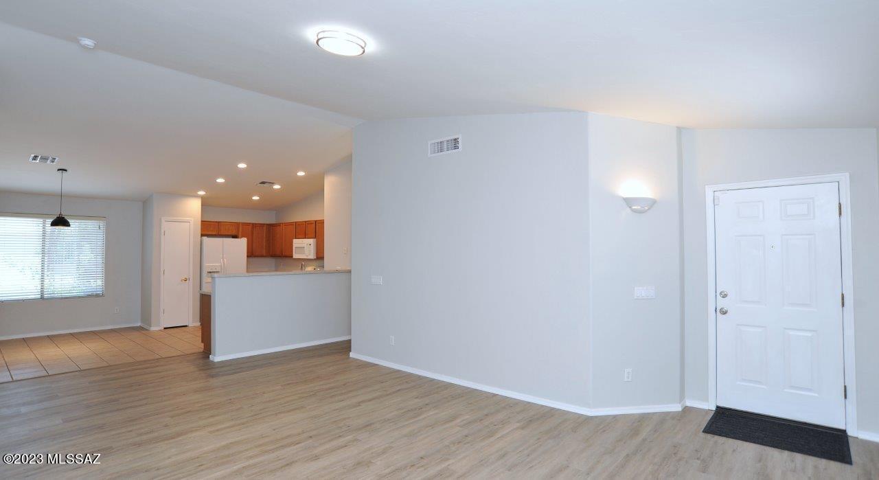 4543 South Valley Road Tucson, AZ 85714 - Photo 6 of 41 a view of empty room with wooden floor