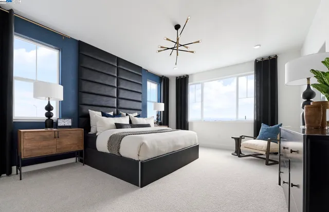 a bed room with a bed and a couch