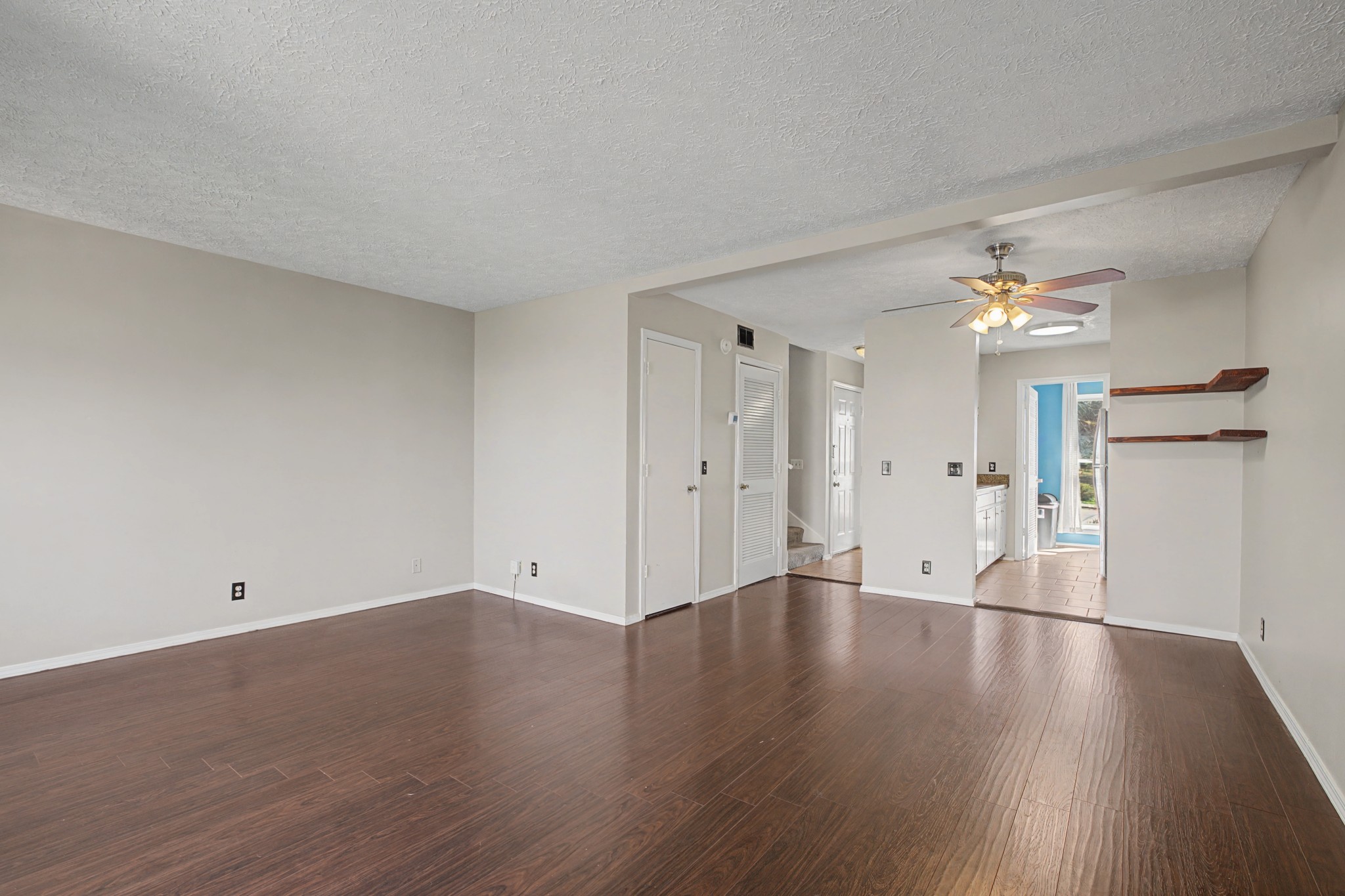 4316 Baton Rouge Drive Hermitage, TN 37076 - Photo 4 of 20 a view of a room with wooden floor and a ceiling fan