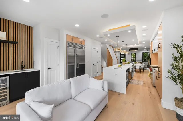 a kitchen with a dining table and chairs