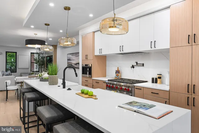 view of a potted plant in a bathroom next to a white wall
