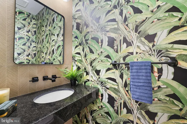 a view of balcony with wooden floor and outdoor seating