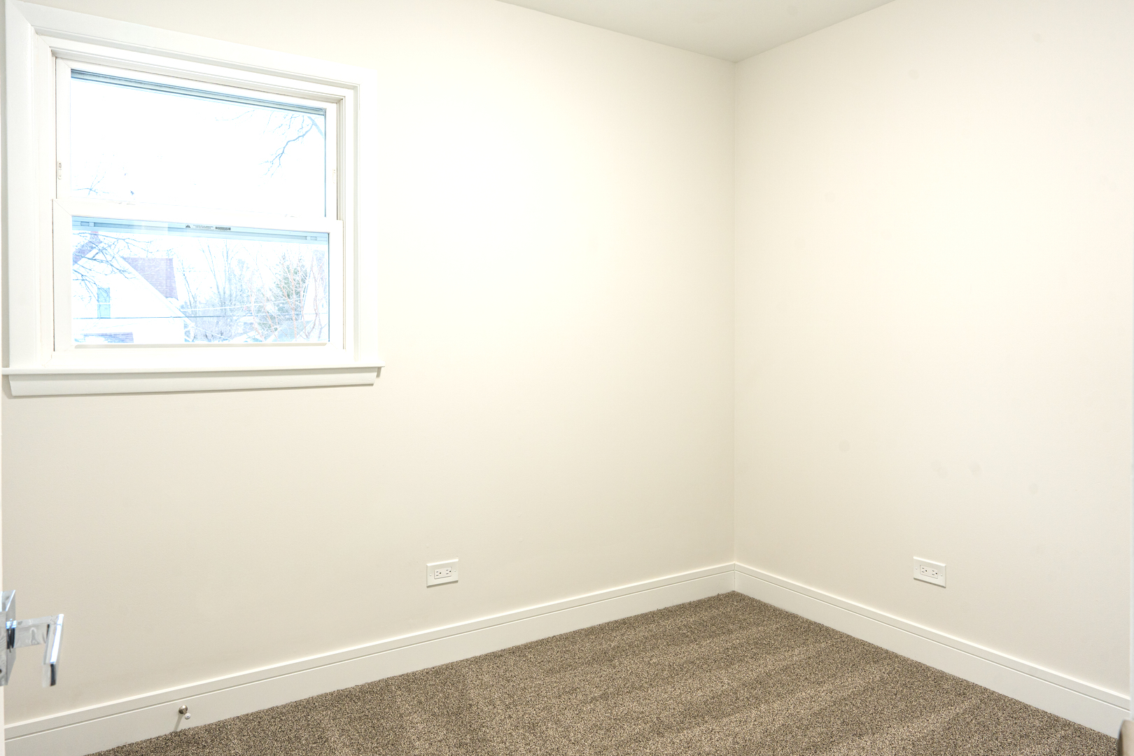 11 South Alfred Avenue Elgin, IL 60123 - Photo 14 of 22 an empty room with a window