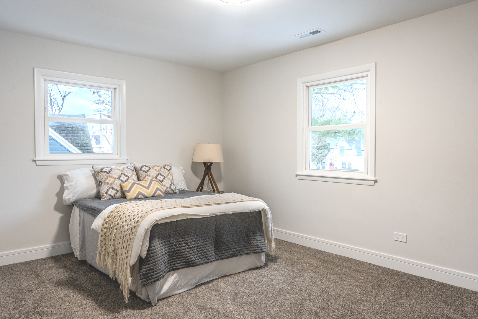 11 South Alfred Avenue Elgin, IL 60123 - Photo 9 of 22 a bedroom with a bed and a window