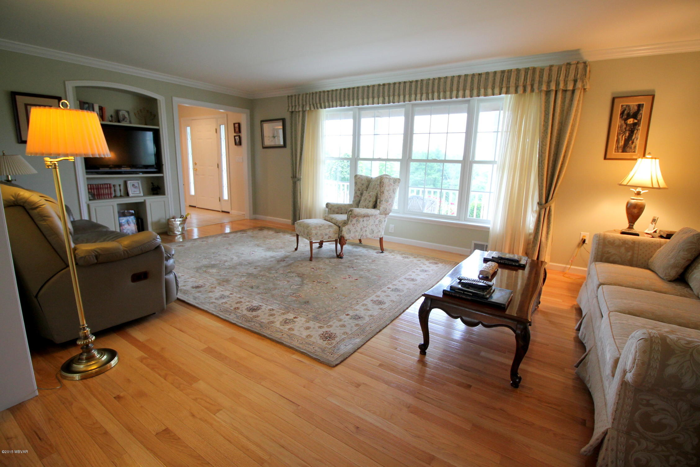 1938 Ridge Crest Circle Williamsport, PA 17701 - Photo 4 of 22 Spacious Living Room with Andersen Windows