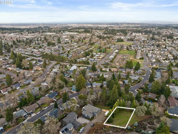 an aerial view of a city with lots of residential buildings