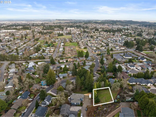 an aerial view of a city with lots of residential buildings