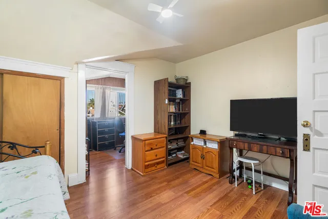 a bathroom with a sink toilet and a mirror