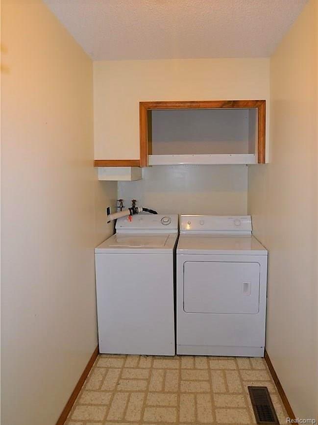 11365 Linden Road Linden, MI 48451 - Photo 21 of 22 1ST FLOOR OR LOWER LEVEL LAUNDRY
