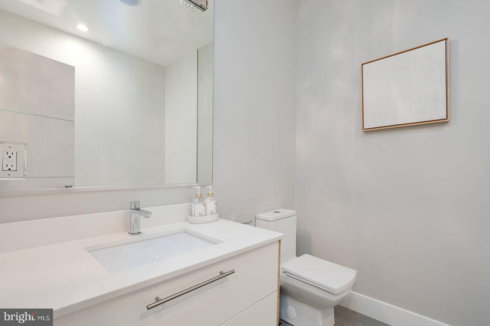 1461 Chapin Street Northwest Washington, DC 20009 - Photo 36 of 67 Sleek, modern bathroom with minimalist design.