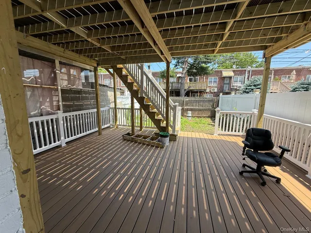 a view of a chairs and table on the wooden floor