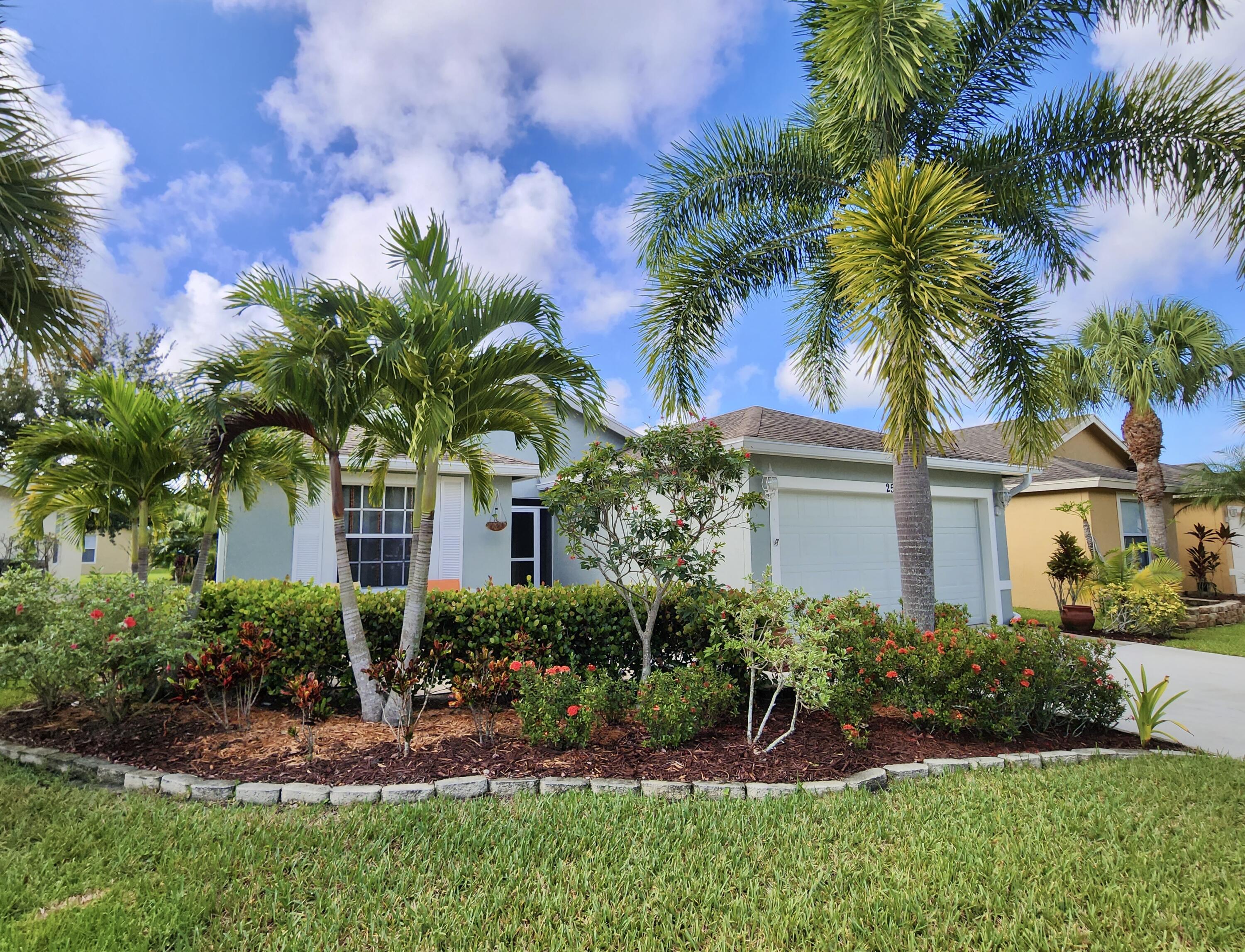 2584 Southwest Impala Way Stuart, FL 34997 - Photo 52 of 72 Beautifully landscaped yard