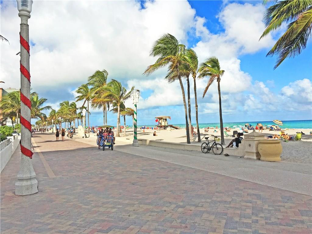 1910 North Surf Road, Unit 7 Hollywood, FL 33019 - Photo 14 of 17 a view of a street with cars
