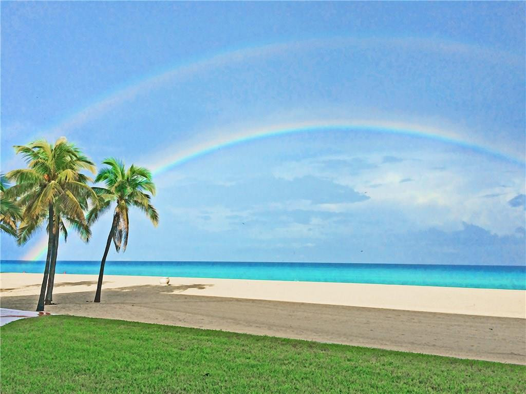 1910 North Surf Road, Unit 7 Hollywood, FL 33019 - Photo 17 of 17 a view of a yard and basketball court