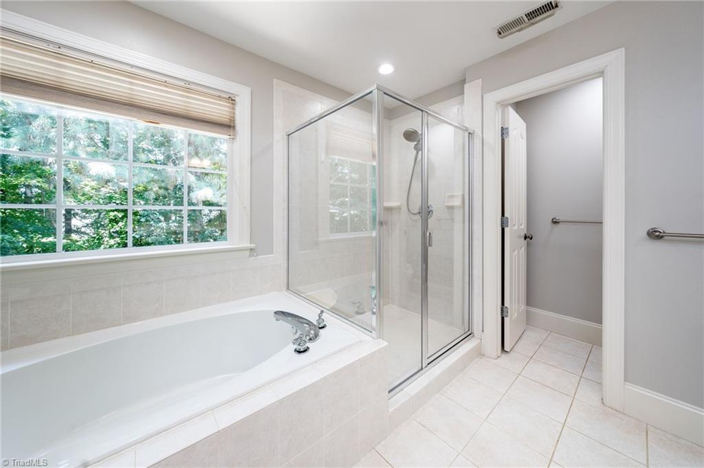 1041 Barnford Mill Road Wake Forest, NC 27587 - Photo 22 of 41 primary shower & soaker tub
