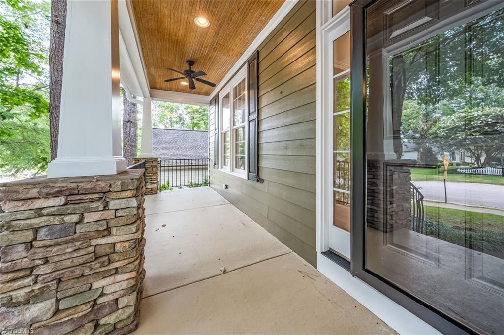 1041 Barnford Mill Road Wake Forest, NC 27587 - Photo 4 of 41 Porch with beadboard ceiling & stone