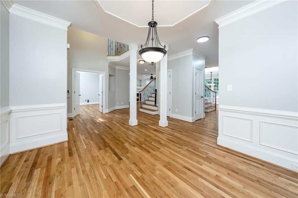 1041 Barnford Mill Road Wake Forest, NC 27587 - Photo 8 of 41 Dining room with wainscoting & ornate ceiling