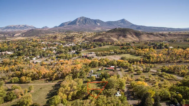 a view of a city with mountains in the background