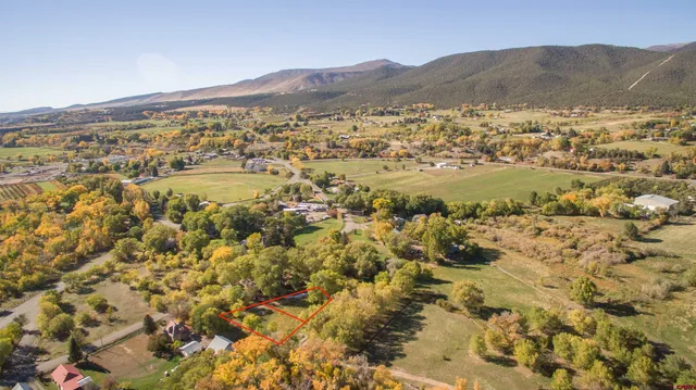 a view of a city with mountains in the background