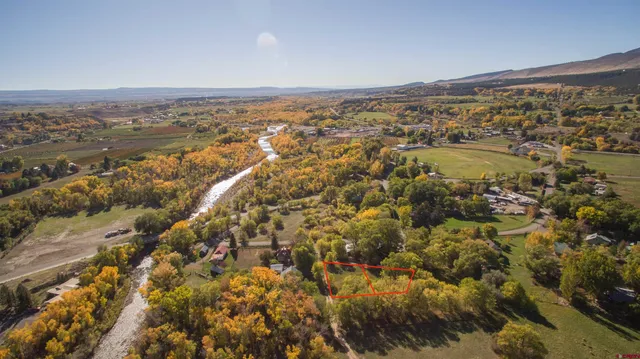 an aerial view of beach and city