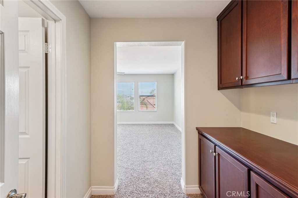 28552 Rustic Glen Street Menifee, CA 92584 - Photo 26 of 48 Flexible upstairs living space with bedroom, bathroom, and storage