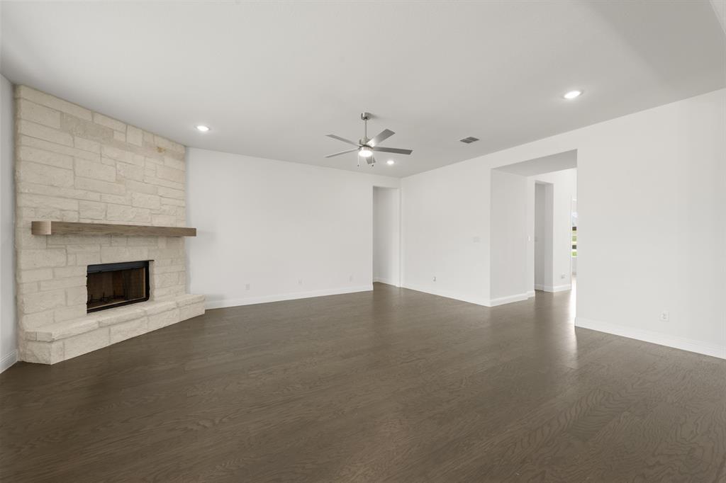 27 Old Crow Road Joshua, TX 76058 - Photo 11 of 35 a view of an empty room with a fireplace