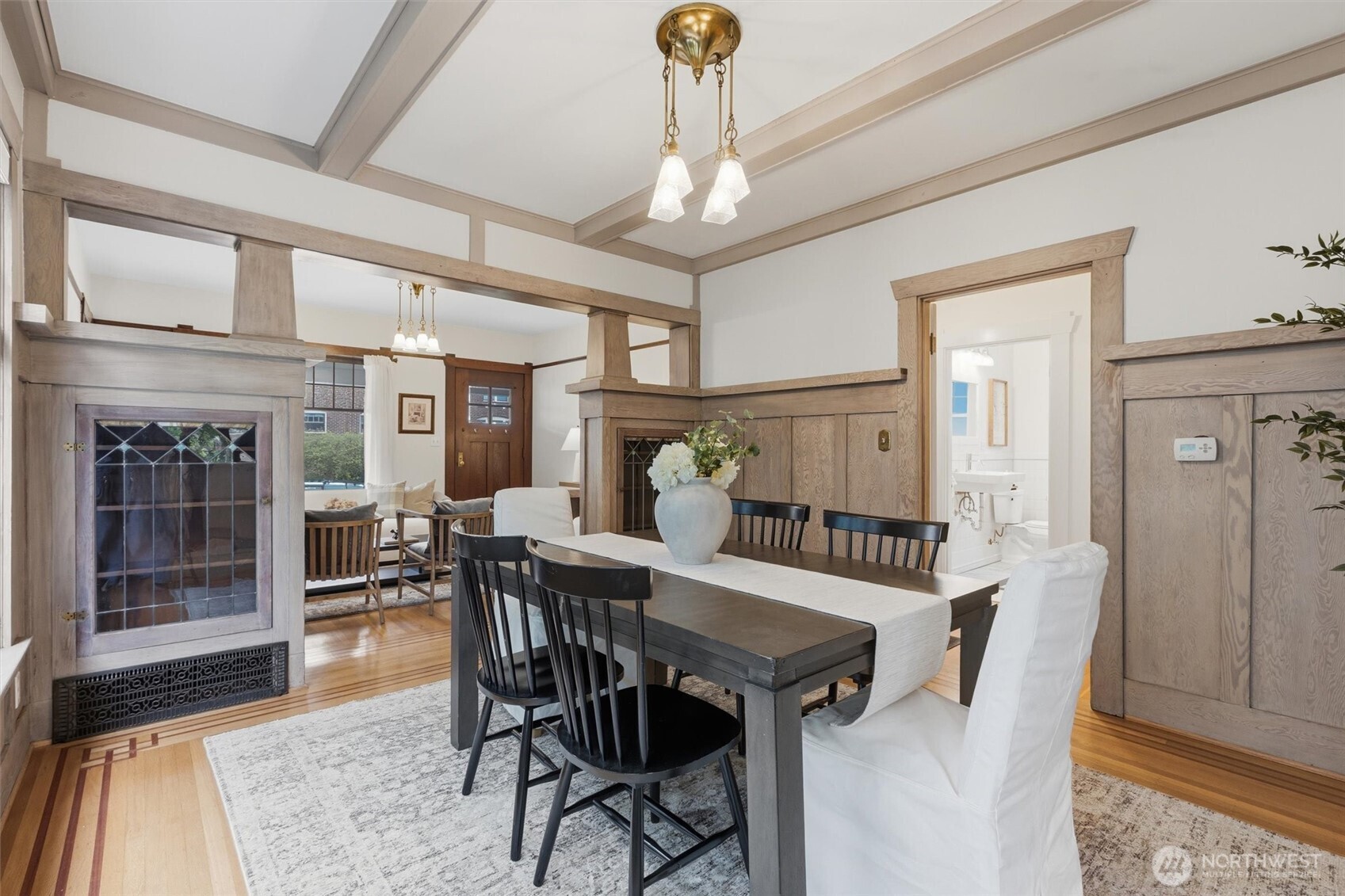 715 North 48th Street Seattle, WA 98103 - Photo 6 of 37 a view of a dining room with furniture