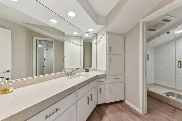 a building outdoor space with patio furniture and glass door