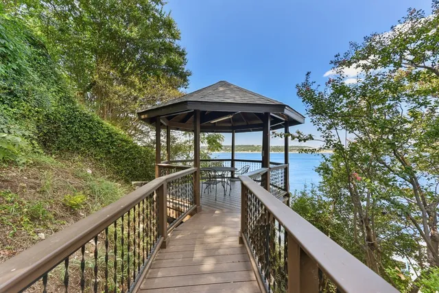 a view of a balcony with furniture